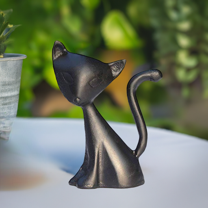 Black cat ring holder figurine with sleek body and curved tail
