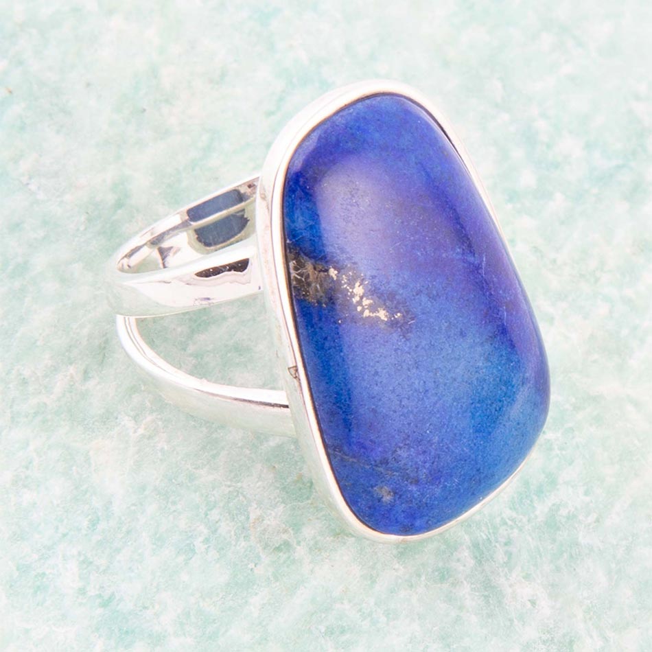 Sterling silver ring with large oval blue lapis cabochon, bezel setting
