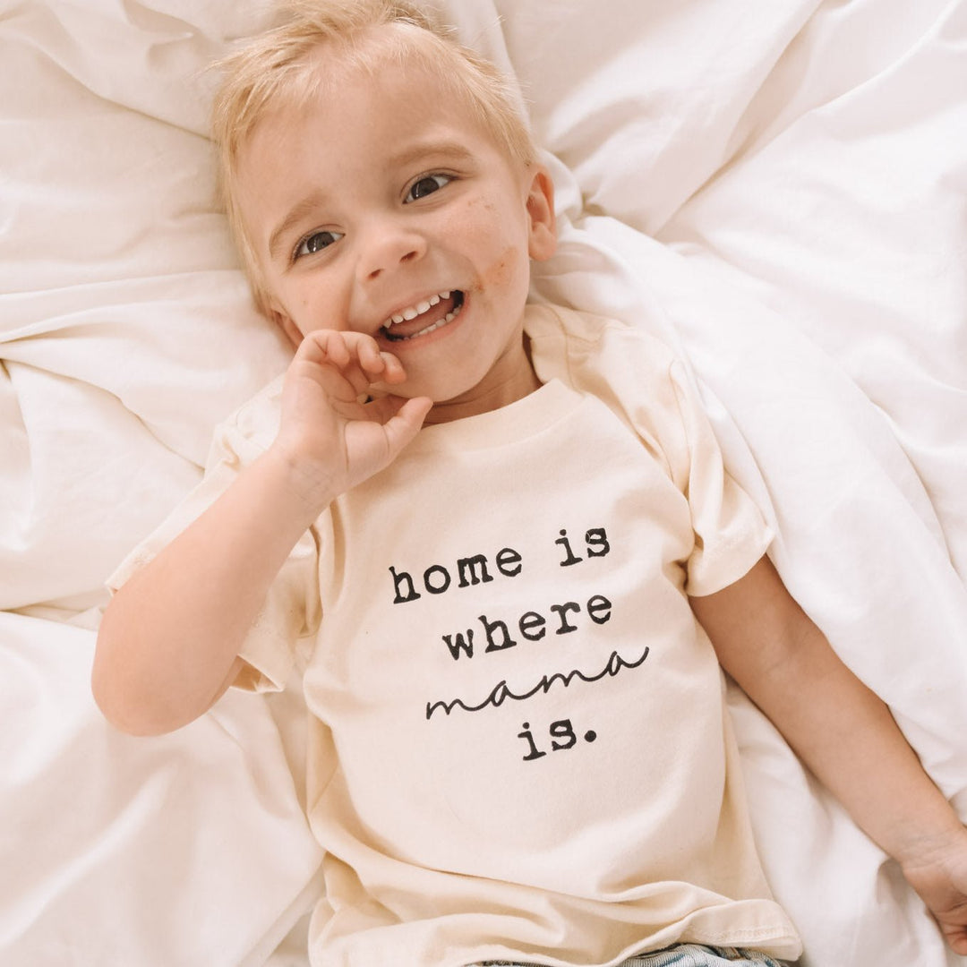 Toddler cream T-shirt with "home is where mama is" text, short sleeves