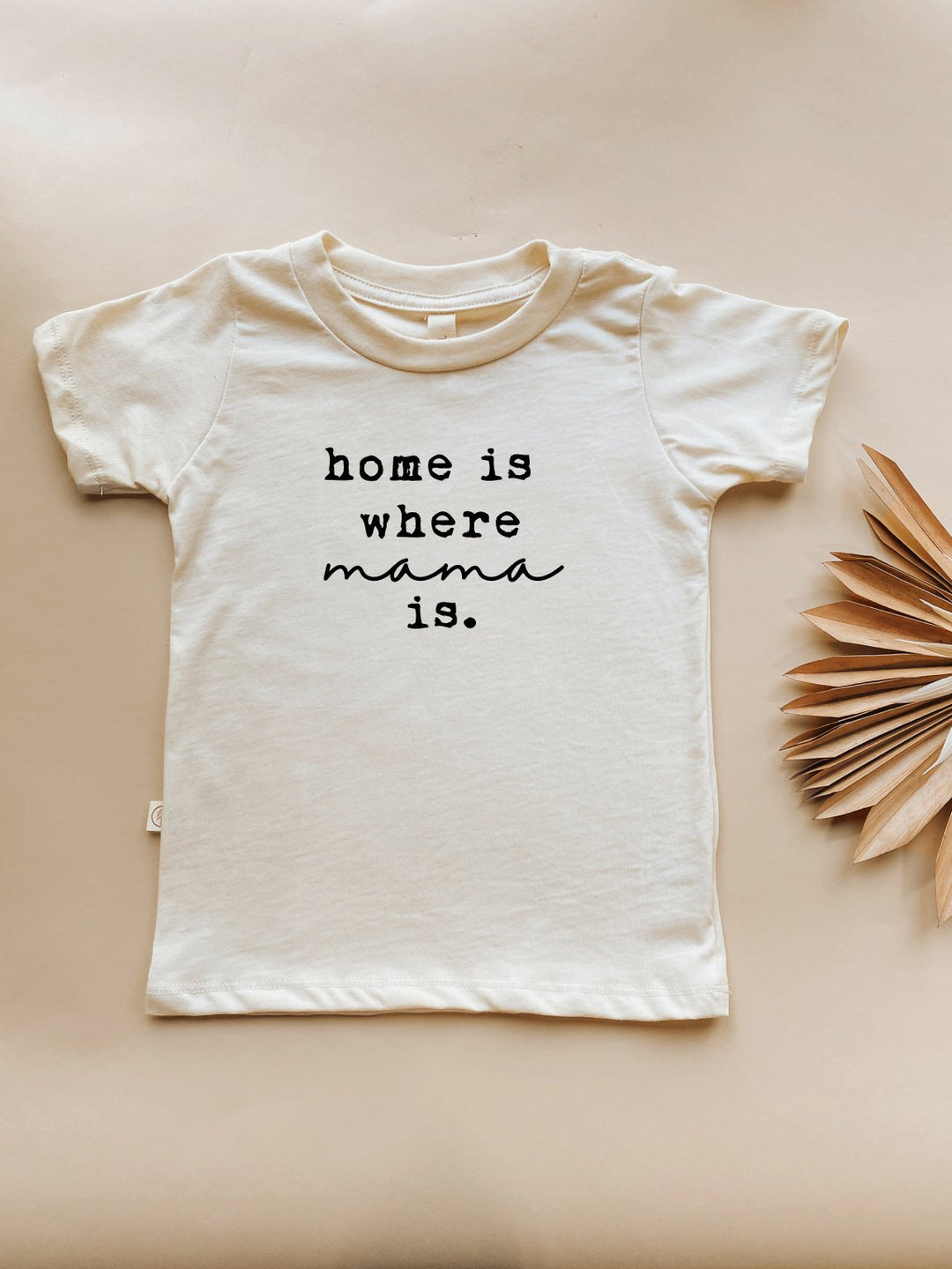 Kids cream crew-neck T-shirt with "home is where mama is" text on front