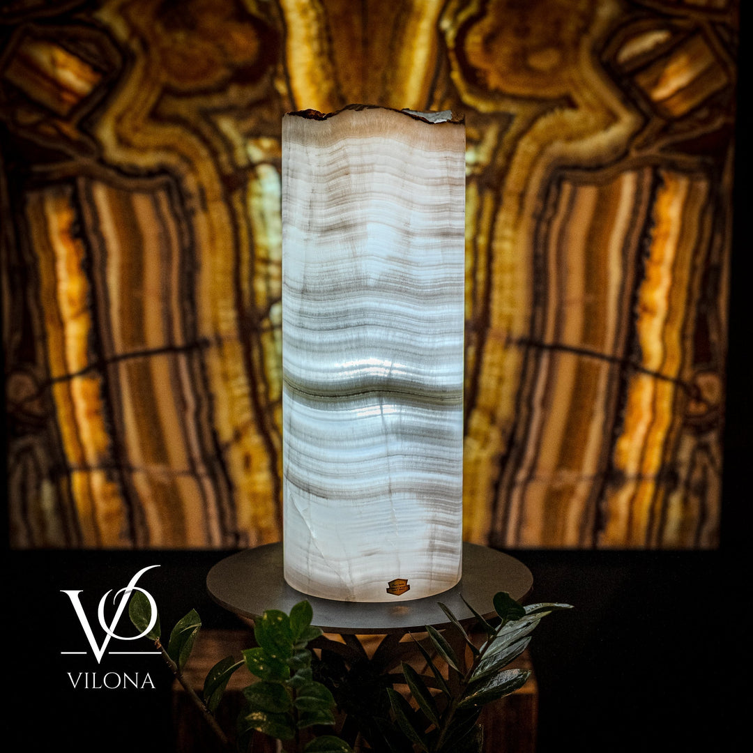 Translucent onyx table lamp with live-edge cylinder shade and black round base