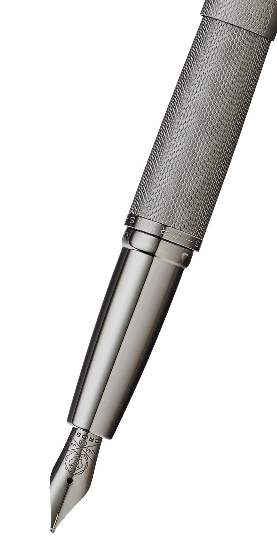 Gray fountain pen tip with medium nib and textured barrel grip