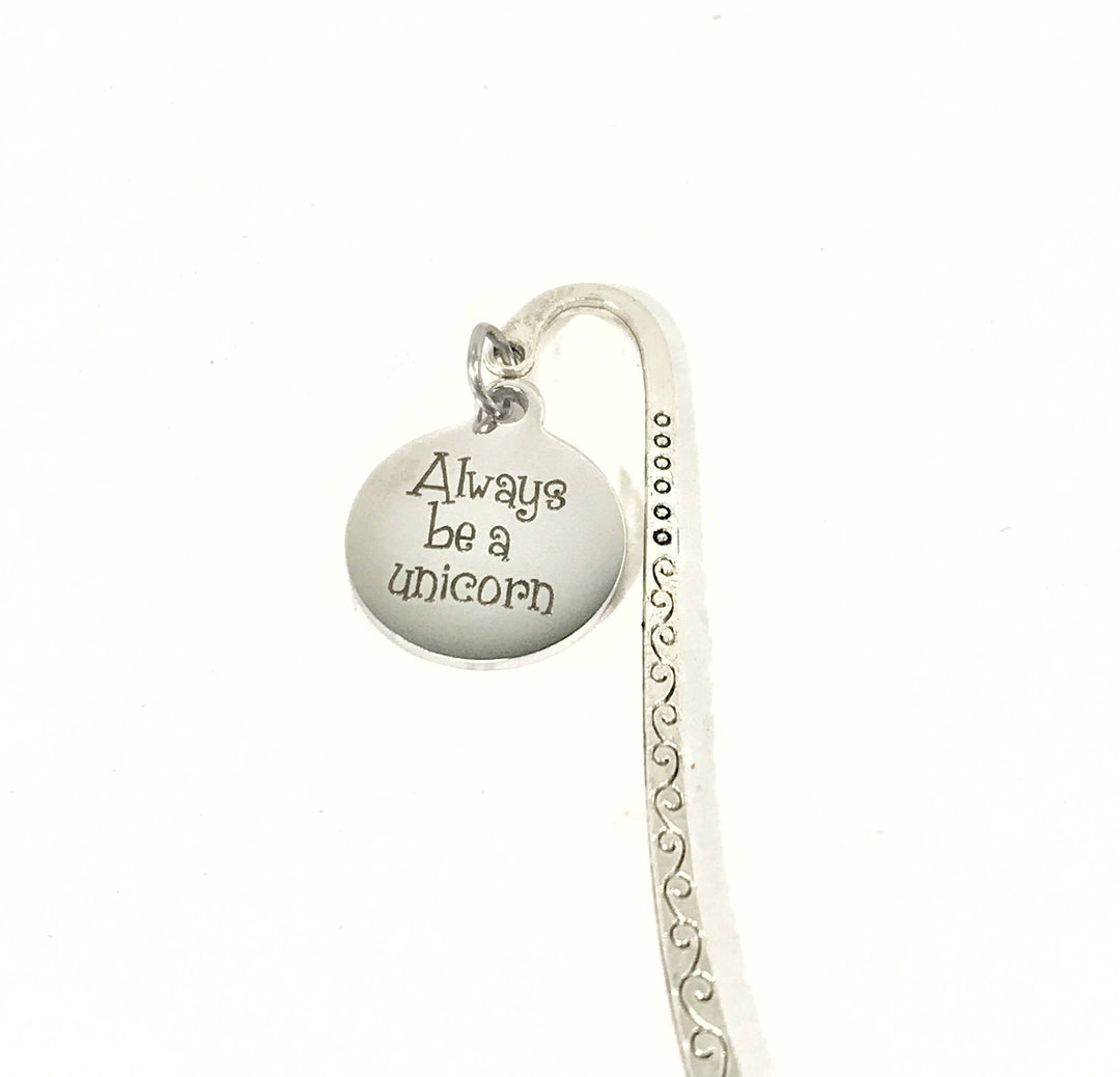 Silver heart bookmark with 'Always be a unicorn' text and small clasp ring