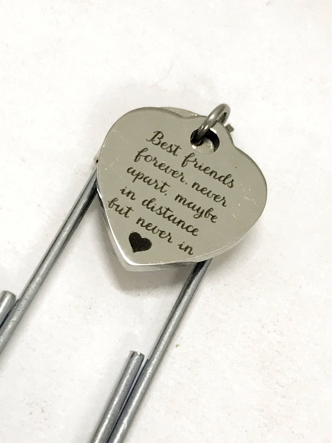 Heart tag paper clip bookmark with engraved message and two metal prongs