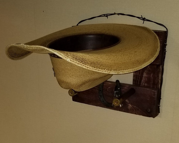 Horizontal wall-hanging western organizer with beige hat holder and dark wooden base