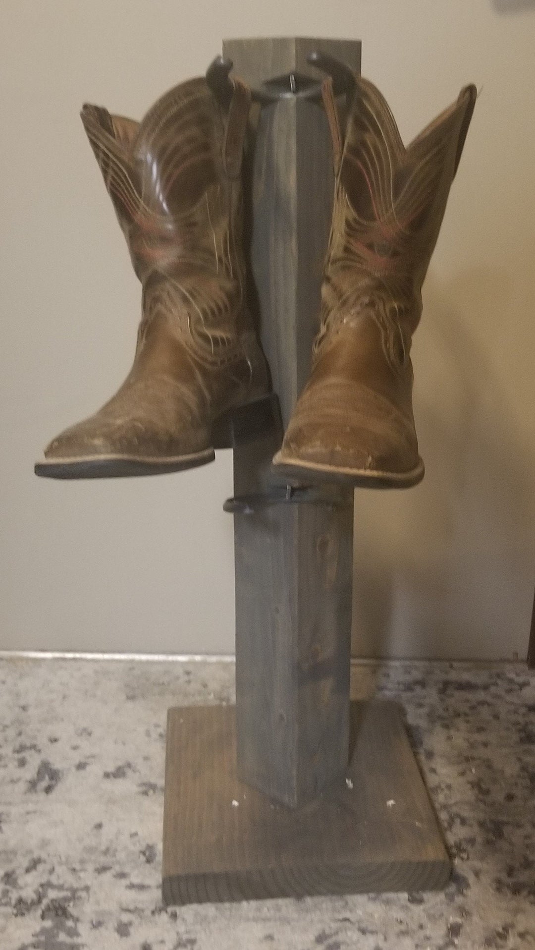 4-pair cowboy boot floor stand with metal boot loops and square wooden base