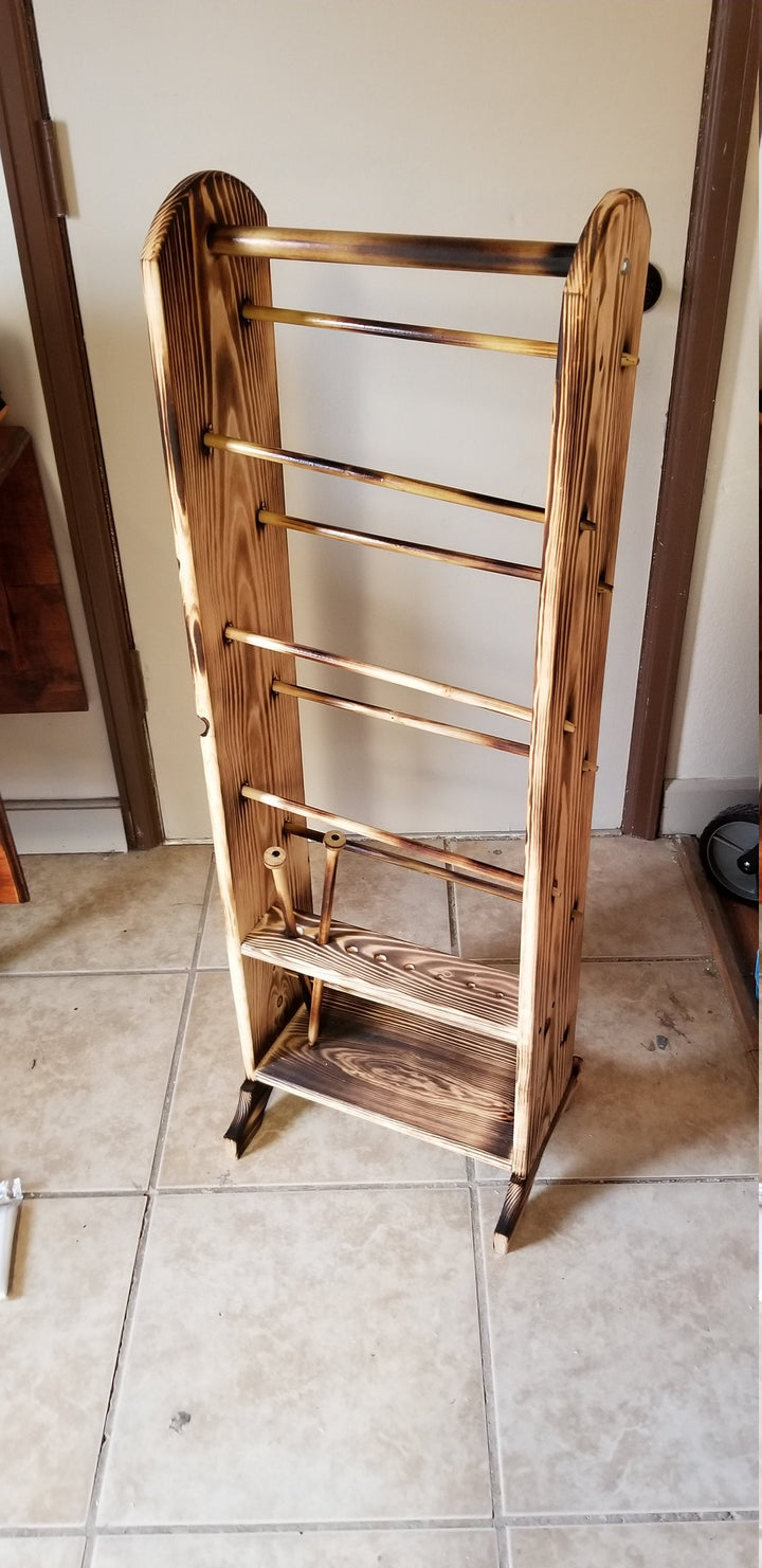 Freestanding wooden yarn organizer rack with horizontal bars and side posts