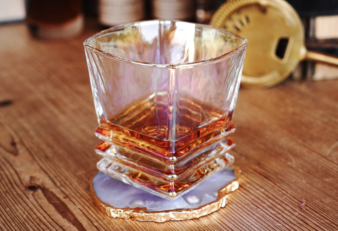 Iridescent lowball whiskey glass, square-cut sides and stacked ring base