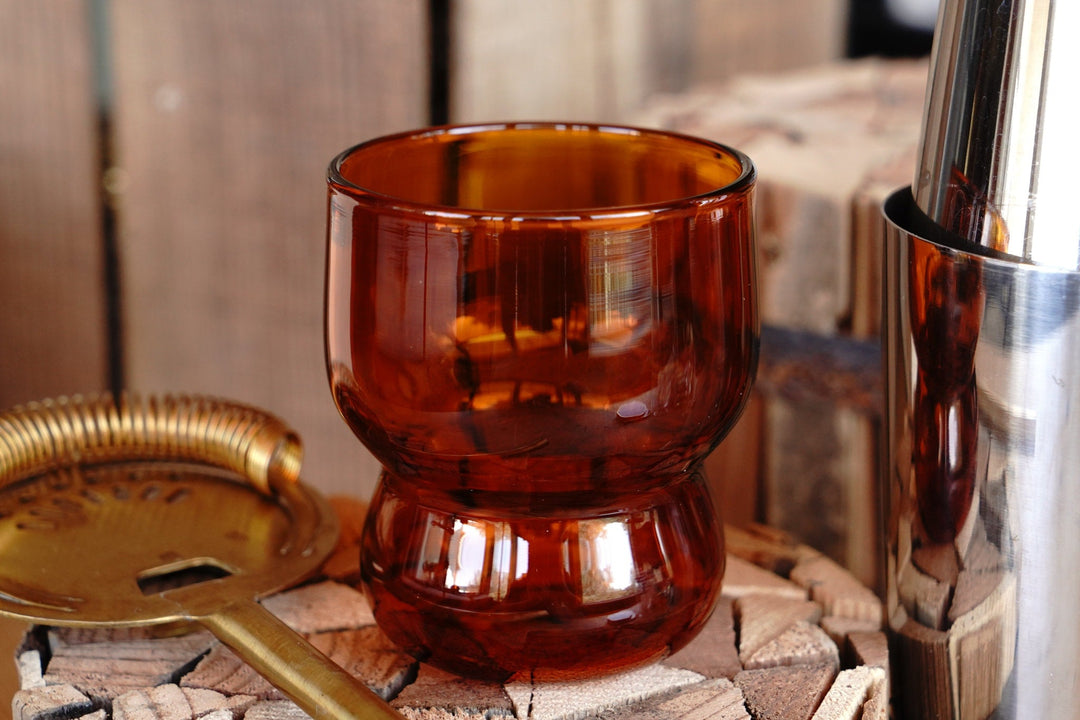 Amber orange bubble juice glass with double-tier base