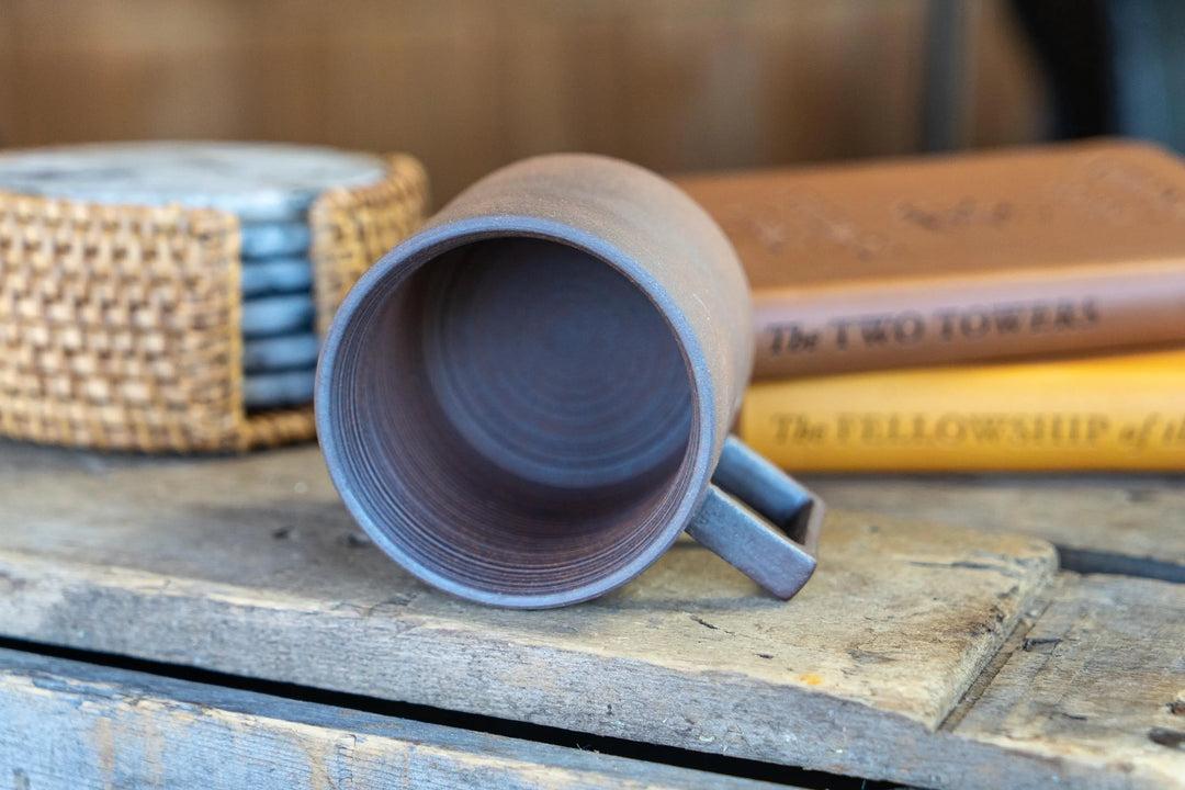 Stoneware espresso mug, light purple-gray, open top and side handle