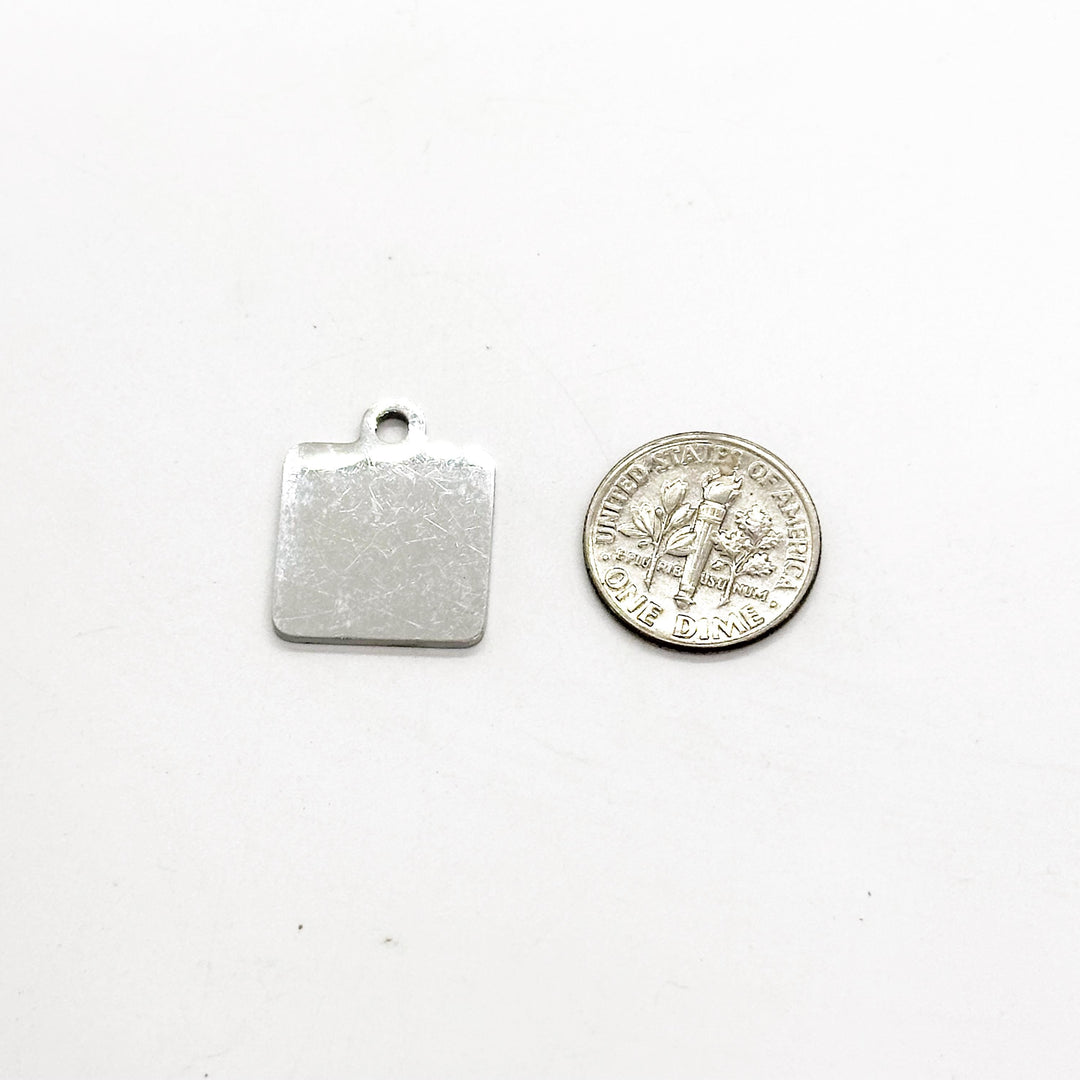 Engraved stainless steel charm with hanging hole for paperclip bookmark