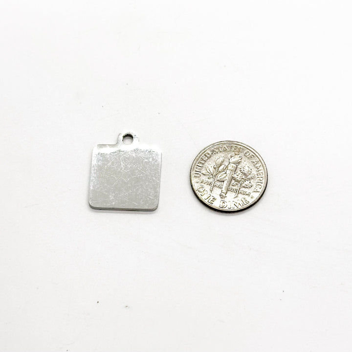 Engraved stainless steel charm with hanging hole for paperclip bookmark
