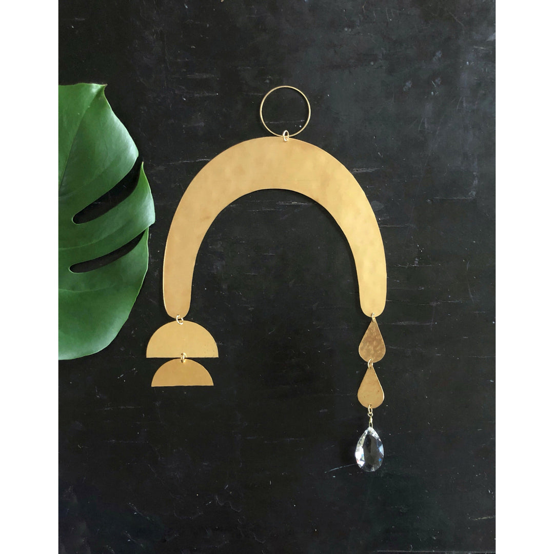 Promesa suncatcher: large gold arch with small crescents and clear teardrop bead