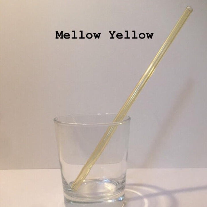 10-inch reusable straw in Mellow Yellow, shown diagonally in a clear drinking glass.