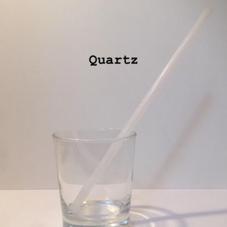 10-inch reusable straw in translucent Quartz white, shown diagonally in a clear drinking glass.