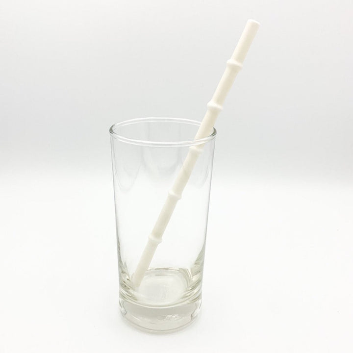 Bamboo-style drinking straw with light cream tip and ribbed segments