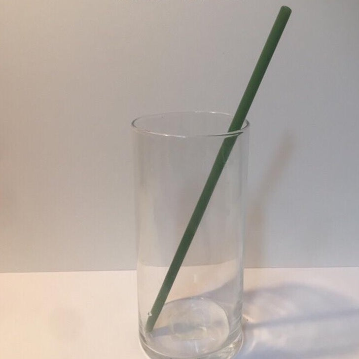 Emerald green reusable XL straight drinking straw in clear cup