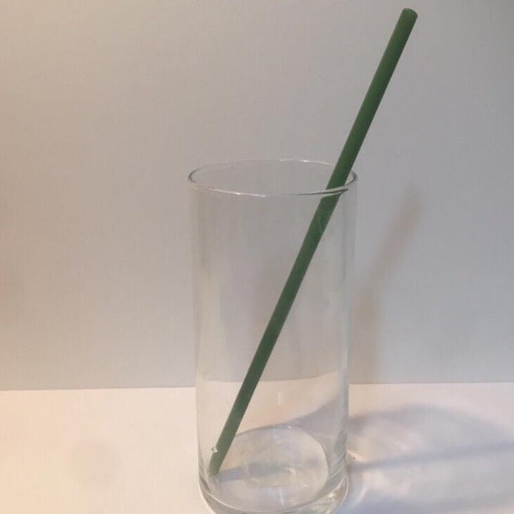 Emerald green reusable XL straight drinking straw in clear cup