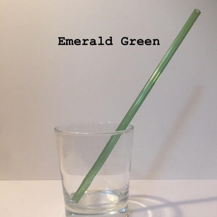 10-inch reusable straw in Emerald Green, shown diagonally in a clear drinking glass.
