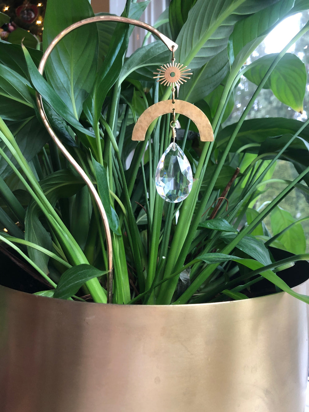 Garden suncatcher stick with arched tan crescent and hanging faceted glass crystal