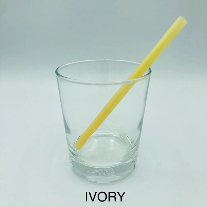 Ivory 6-inch cocktail straw in glass cup
