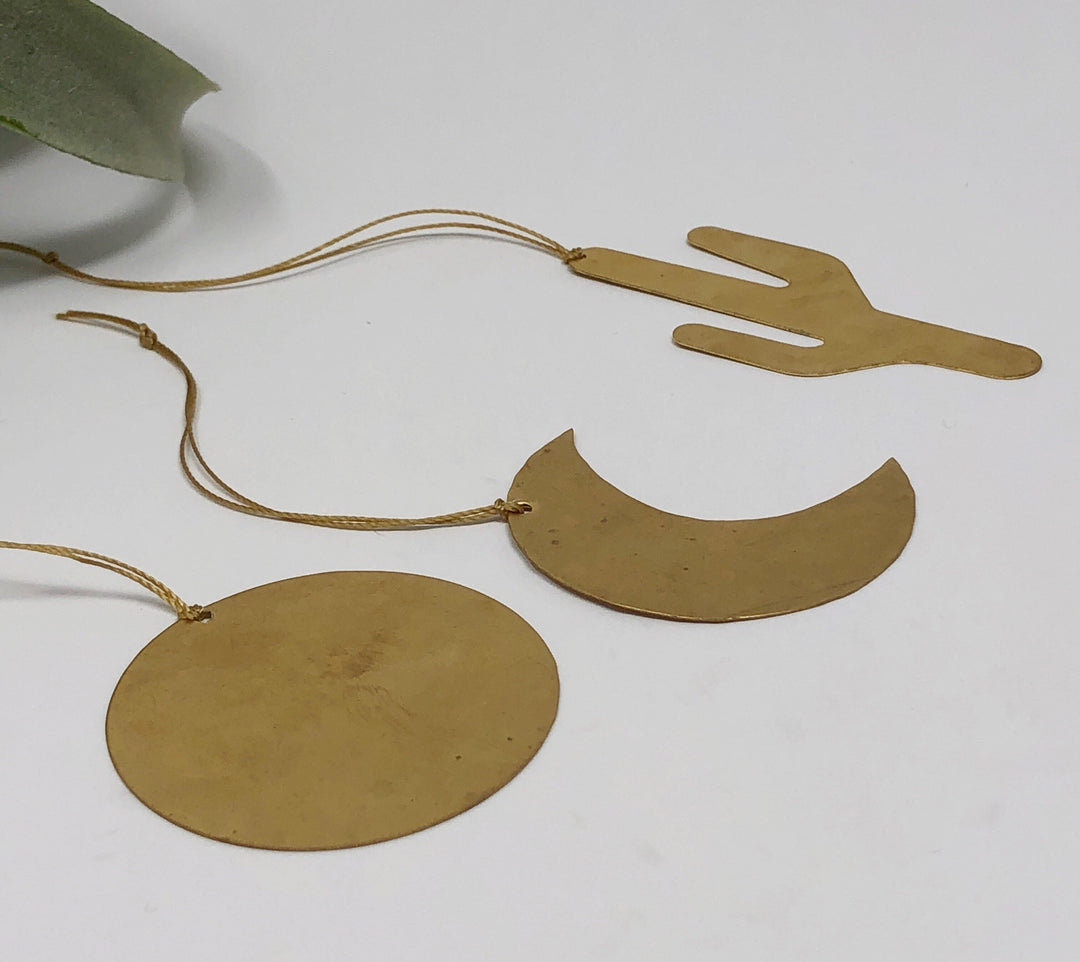 Gold-tone ornament set charms: round disc, crescent moon and cactus shapes with strings