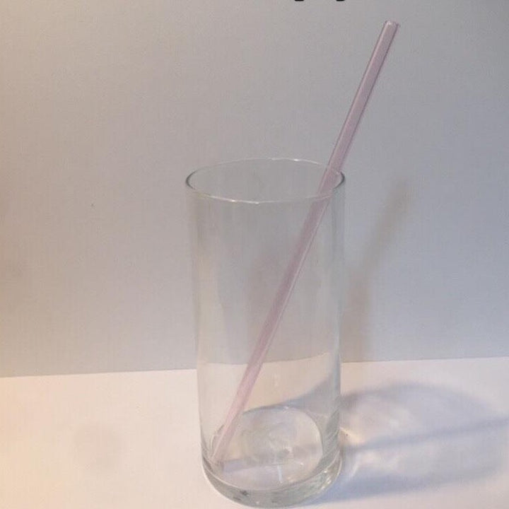 Pink champagne reusable XL straight drinking straw in clear cup