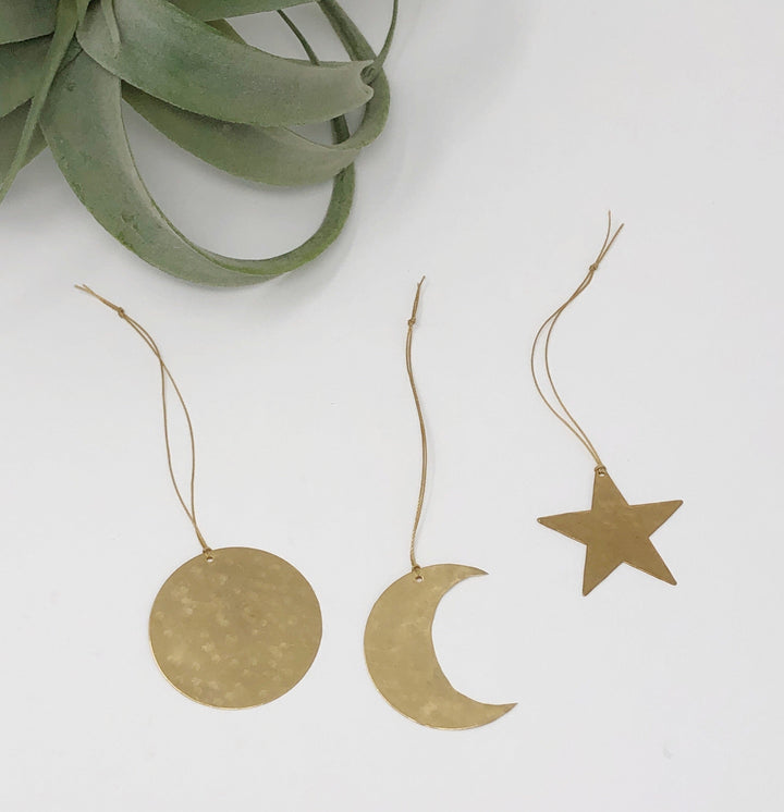 Celestial ornaments set: gold round disk, crescent moon, and star, each on a cord