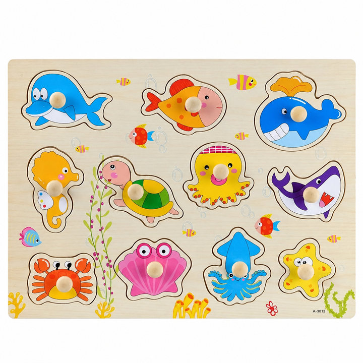 Wooden sea life puzzle board with 3D peg pieces shaped like fish and animals