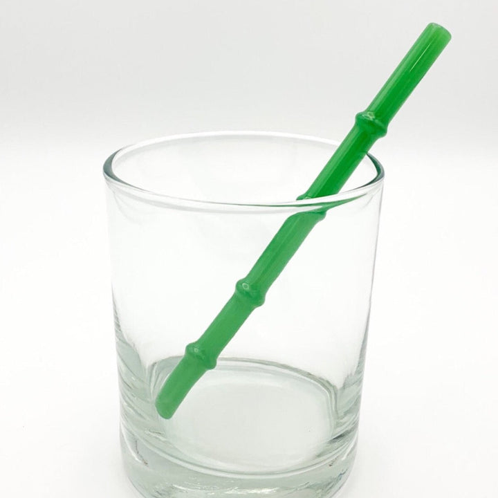 Bamboo-style drinking straw in vivid green, ribbed segmented design