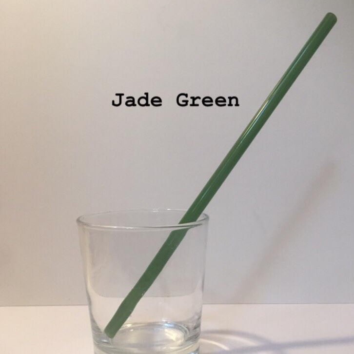 10-inch reusable straw in Jade Green, shown diagonally in a clear drinking glass.