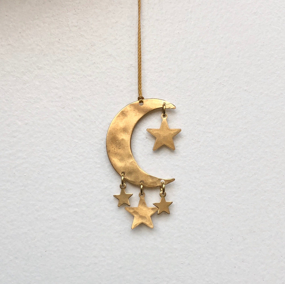 Gold crescent-moon ornament with star charms hanging from the crescent and base hook