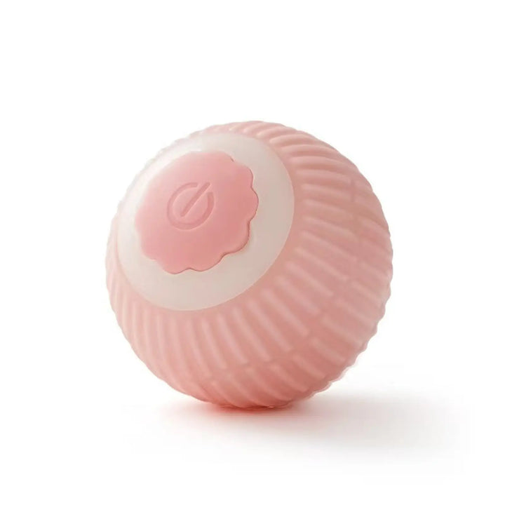 Pink silicone rolling cat ball toy with embossed power button on top