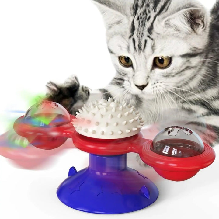 Spinning windmill cat toy with red base, blue stand, and LED light balls; with cat