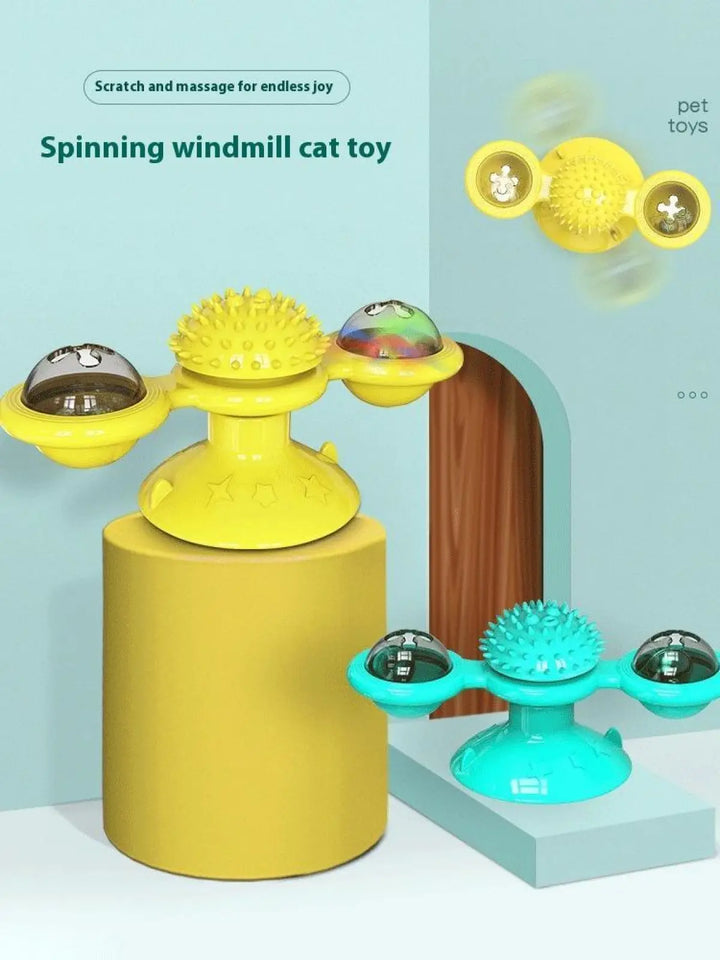 Spinning windmill cat toys in yellow and teal with LED domes and massage spikes