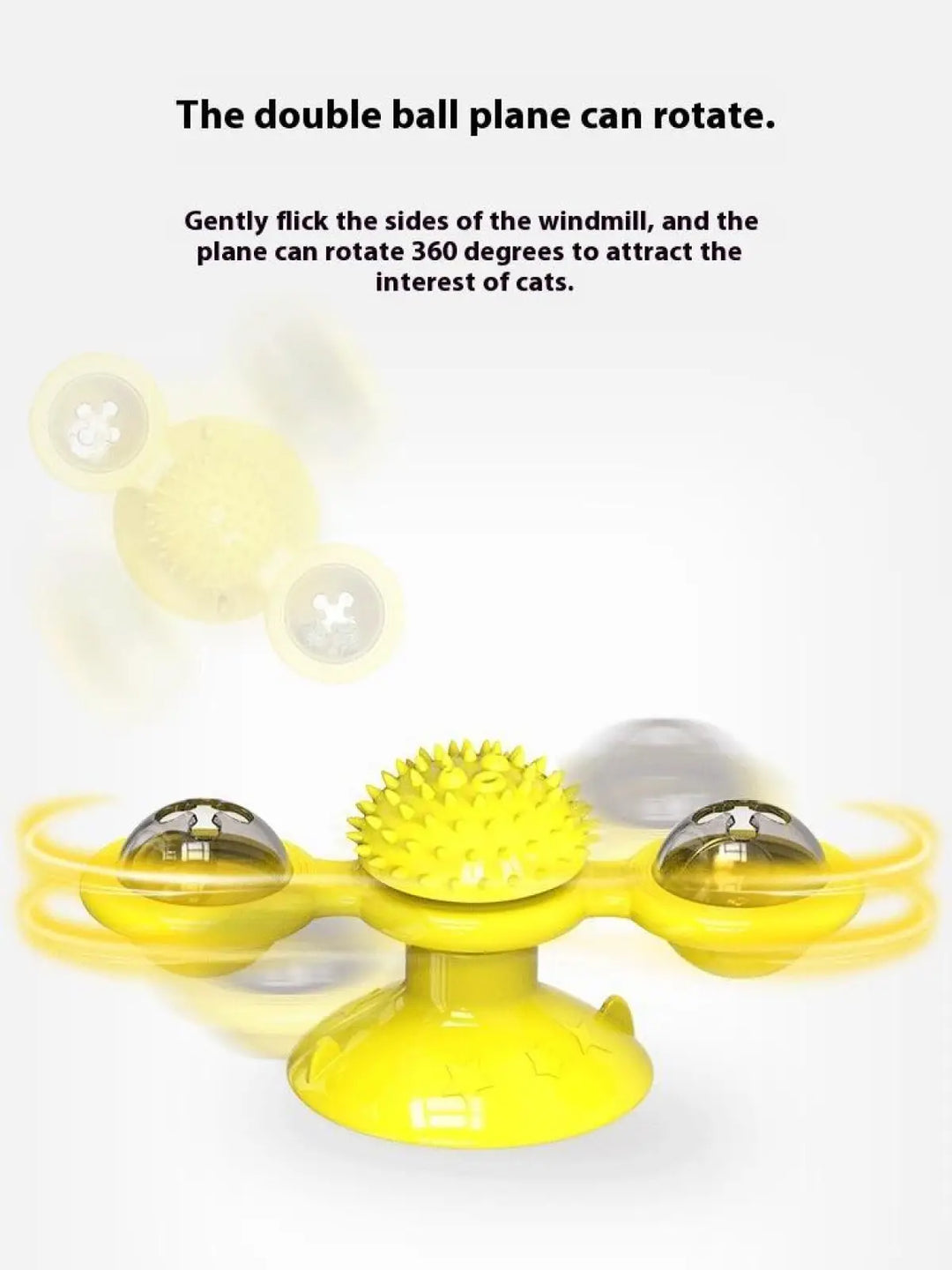 Yellow spinning windmill cat toy with two clear LED domes and spiked center