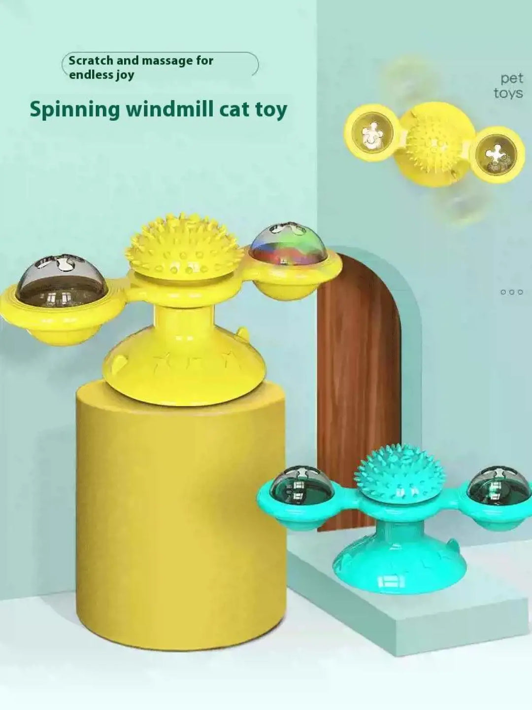 Yellow and teal spinning windmill cat toys with LED domes and spiked massage tops