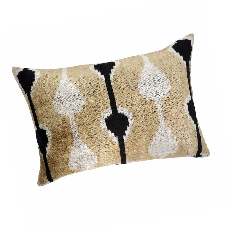Silk velvet ikat throw pillow in beige with white diamond motif and black accents