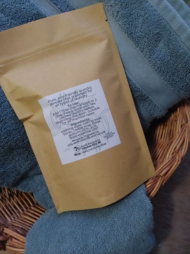 Natural laundry wash powder refill bag with ingredient information label