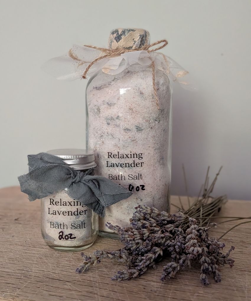 Relaxing Lavender bath salt bottle with small jar and dried lavender flowers