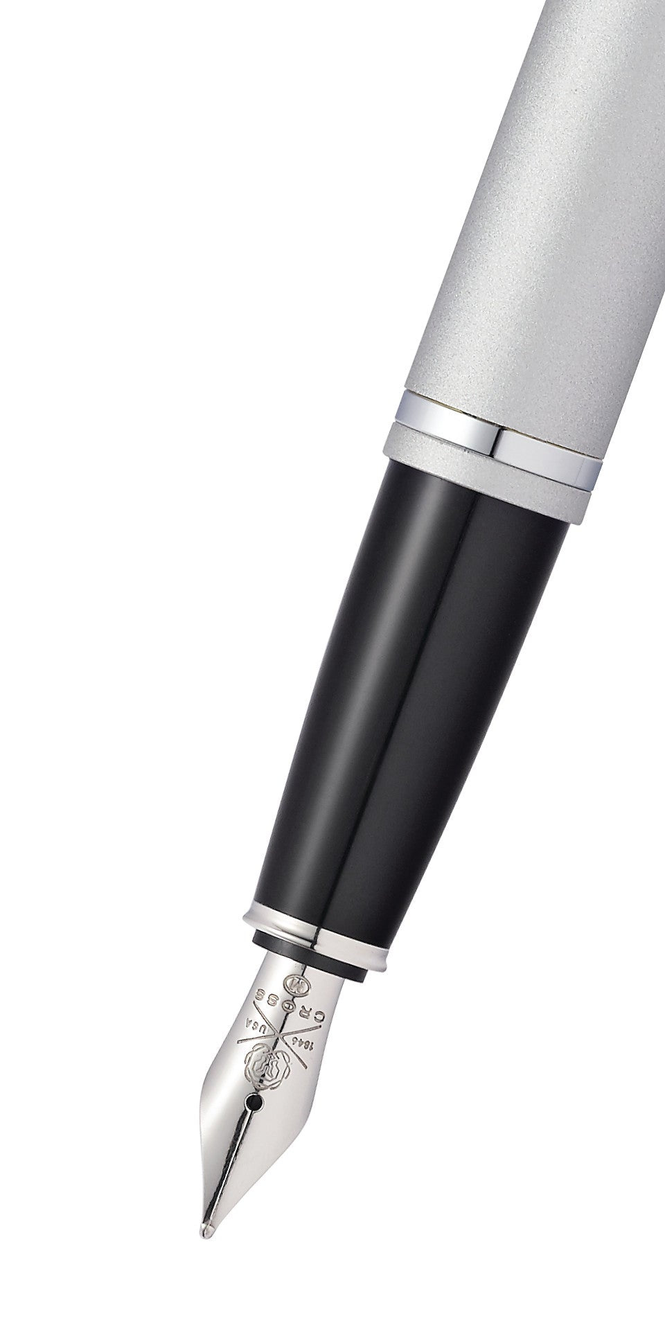 Fountain pen tip with medium nib and engraved nib details, black grip section