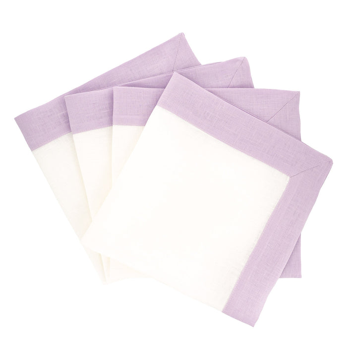 Set of 4 lilac linen napkins with double-sided border, layered flat view