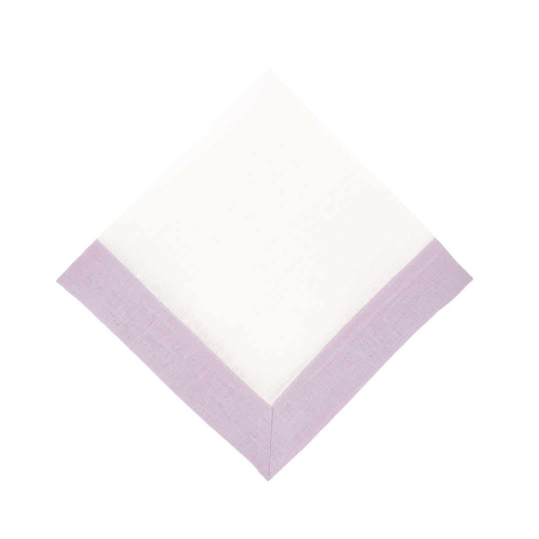 Lilac linen napkin with double-sided border, corner folded in clean square