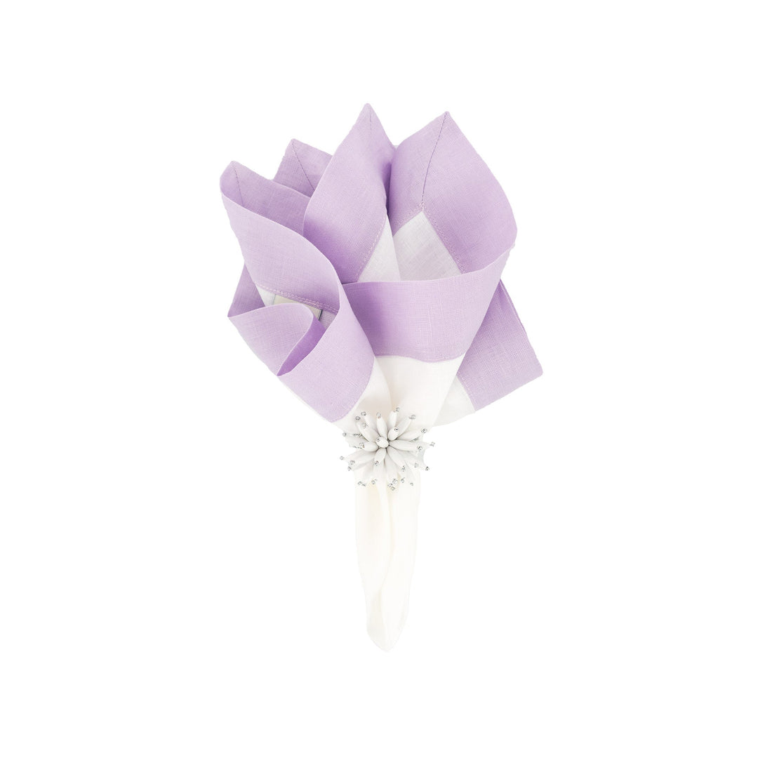 Lilac linen napkins with double-sided border, folded and tied for napkin display