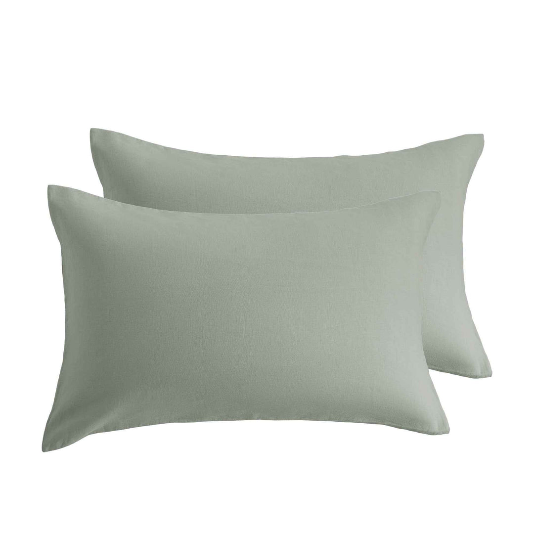 Linen pillowcase set in sage green, two rectangular pillow covers