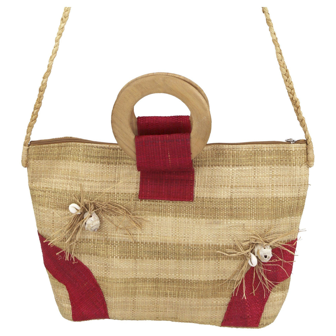 Raffia tote bag with red patterned lower section, round top handle, and rope straps.