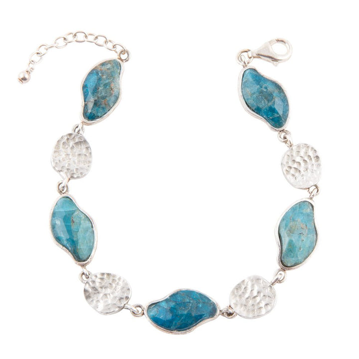 Sterling silver bracelet with blue apatite teardrop stones and textured round bead links