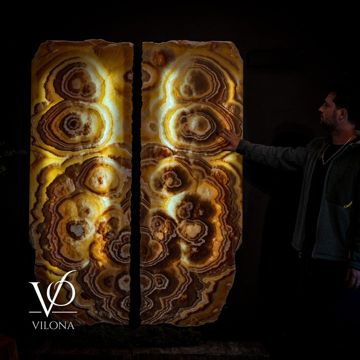 Onyx wall panel set featuring tall paired panels with concentric circular veining.