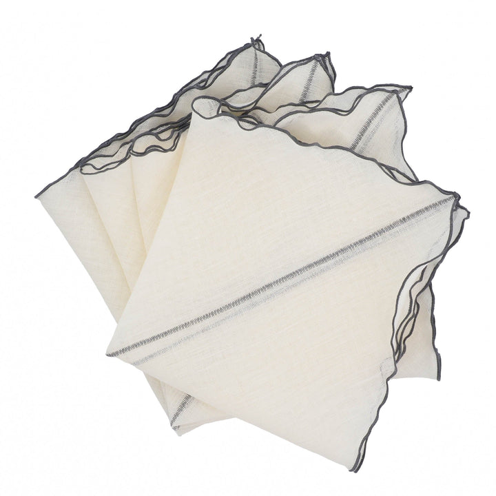 Linen napkins set of 4 in off-white with charcoal ruffled edges, folded