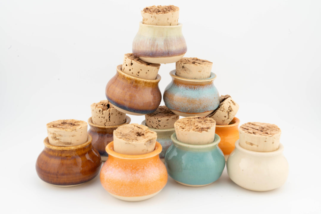 Mini corked jars set with cork lids; assorted glazed colors